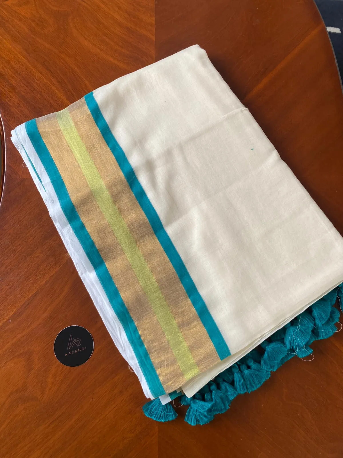 Mul Mul Cotton Saree with Teal & Gold Border